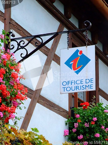 Image of French tourism office sign on half-timbred wall 