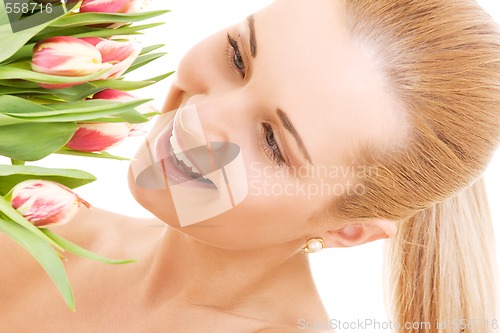 Image of happy woman with flowers