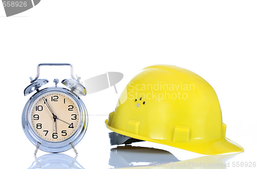 Image of alarm clock and helmet 