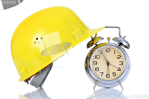 Image of alarm clock and helmet 