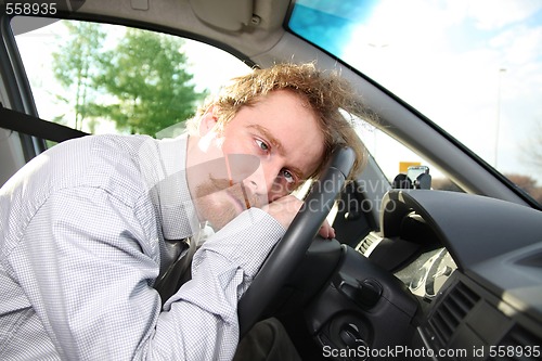 Image of driver sleeps in a car