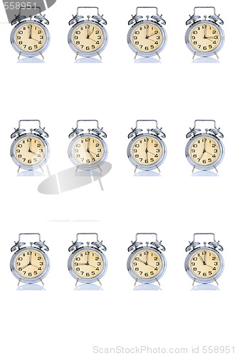 Image of group of alarm clock with times 12 clock 