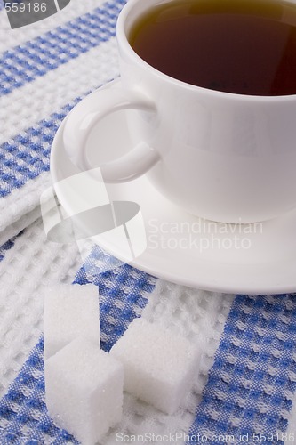 Image of cup of tea and some sugar