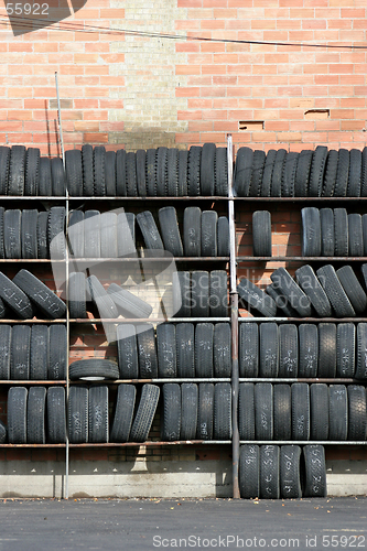 Image of wall of tires, vertical