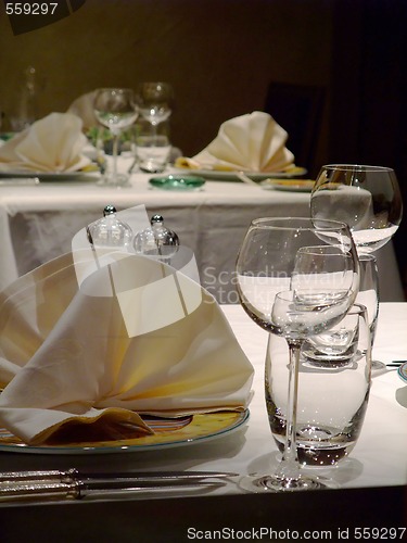 Image of Tables waiting for customers in a french restaurant