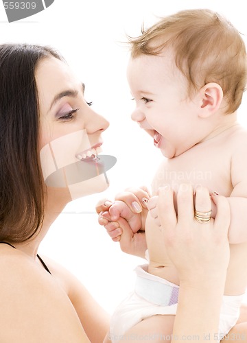 Image of baby boy in mother hands