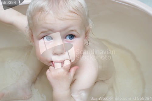 Image of portrait of baby in bath