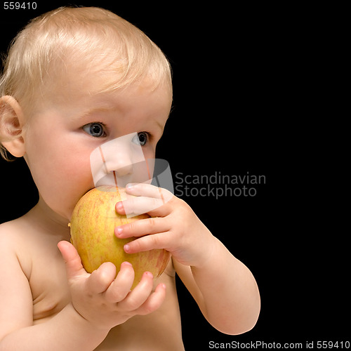 Image of baby with apple
