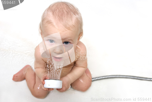 Image of cute baby with the shower