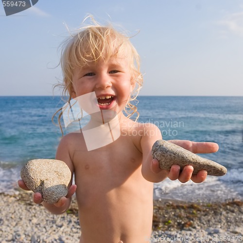 Image of happy child on the beach