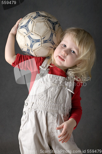 Image of strong girl footballer