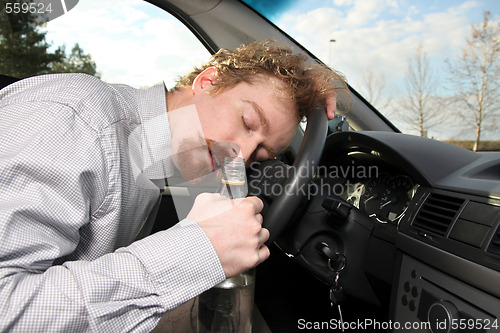 Image of tired driver sleeps