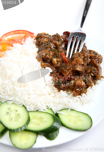 Image of Beef szechuan with fork vertical