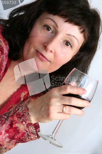 Image of Woman drinking wine