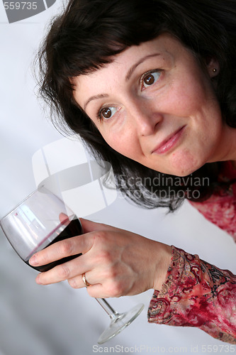 Image of Woman drinking wine