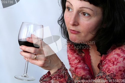 Image of Woman drinking wine