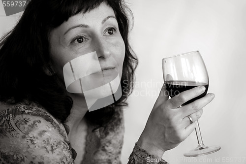 Image of Woman drinking wine