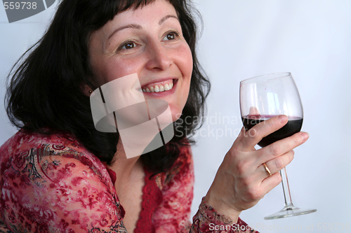 Image of Woman drinking wine