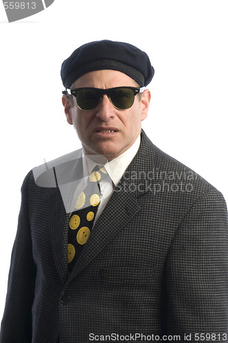 Image of agent in sunglasses french beret