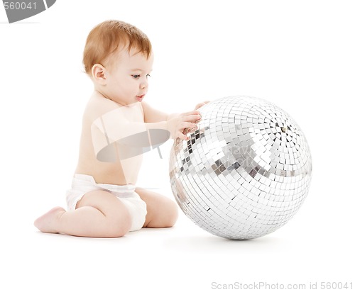 Image of adorable baby boy with big disco ball