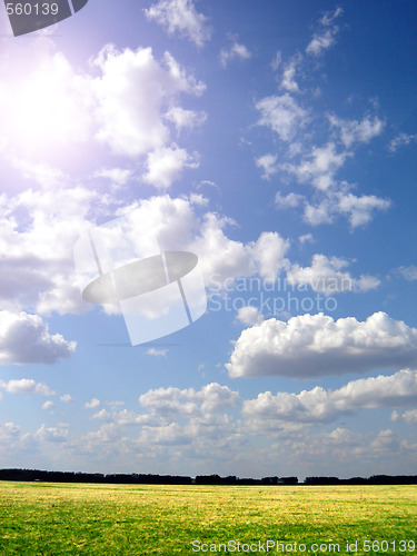 Image of green field and blue sky