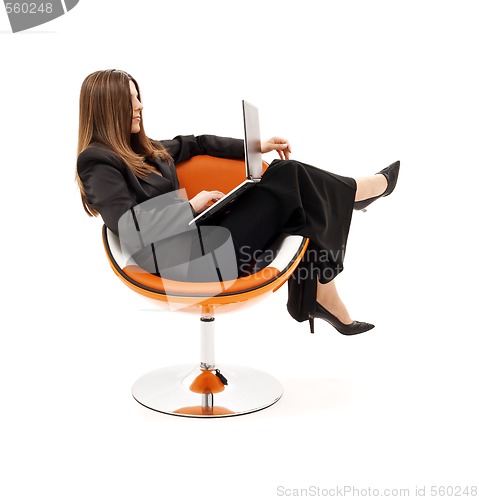 Image of businesswoman in chair with laptop