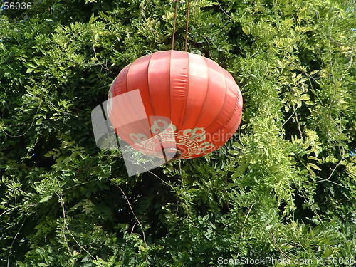 Image of Red lantern vs green background