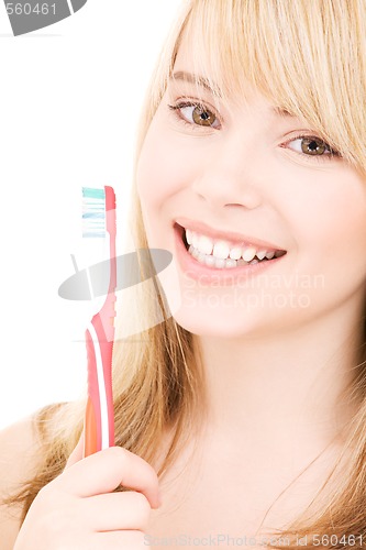 Image of happy girl with toothbrush