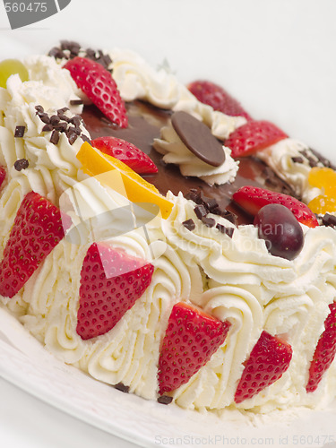 Image of Delicious cream layer cake with strawberries