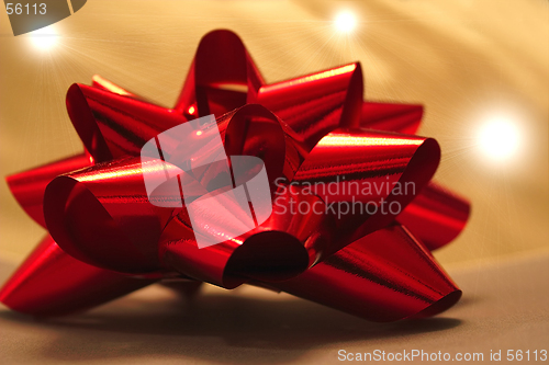 Image of red foil bow and sun flares