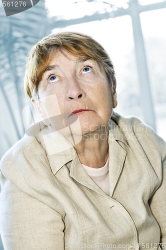 Image of Elderly woman looking up