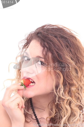 Image of Beautiful girl holding strawberry 