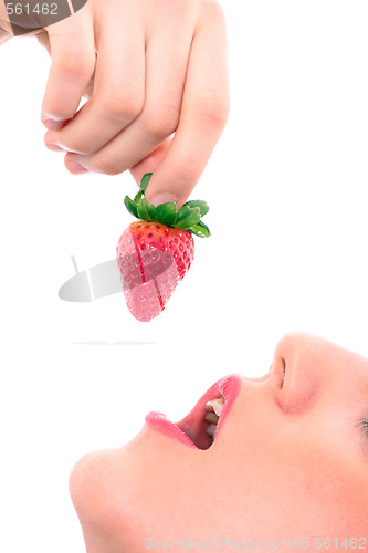 Image of Beautiful girl holding strawberry 