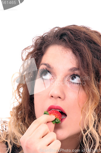 Image of Beautiful girl holding strawberry 