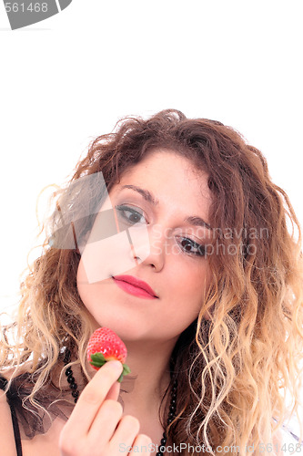 Image of Beautiful girl holding strawberry 