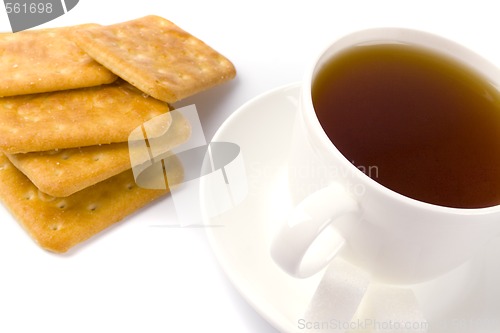 Image of cup of tea, sugar and cookies