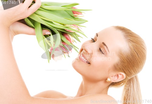 Image of happy woman with flowers