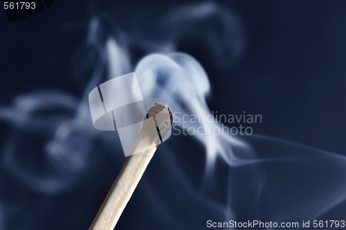 Image of A burning Match