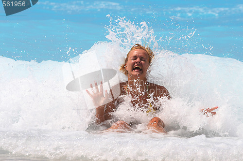Image of Pretty blonde woman enjoying the Ionian sea in Greece