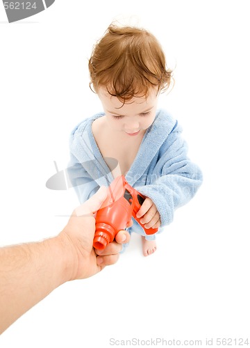 Image of baby boy with toy drill