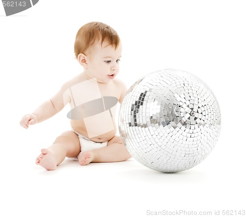 Image of adorable baby boy with big disco ball