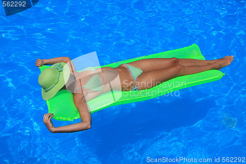 Image of Woman in blue pool