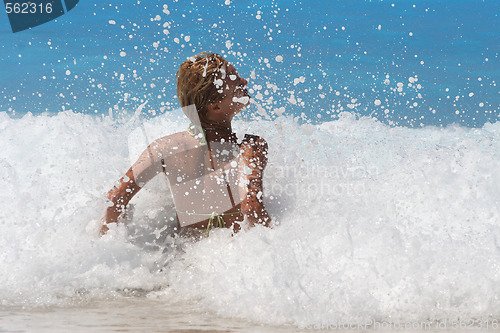 Image of Pretty blonde woman enjoying the Ionian sea in Greece