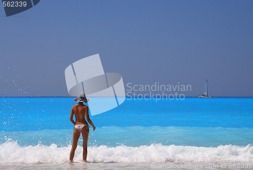 Image of Pretty blonde woman enjoying the Ionian sea in Greece