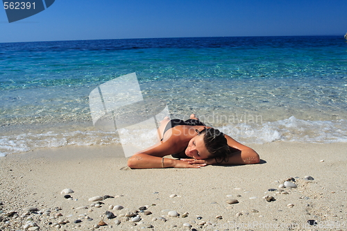 Image of Pretty brunette in bikini