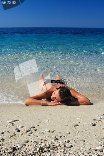 Image of Pretty brunette in bikini