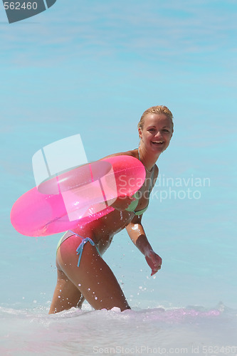 Image of Pretty blonde woman enjoying the Ionian sea in Greece