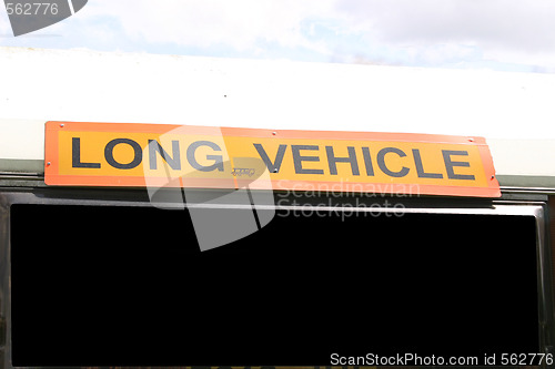 Image of signs for long vehicle and a blank sign