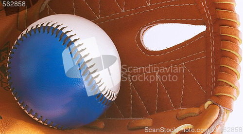 Image of baseball in glove