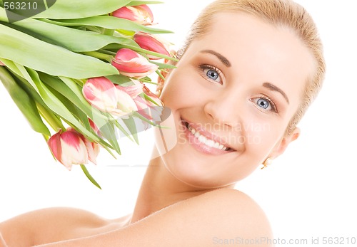 Image of happy woman with flowers